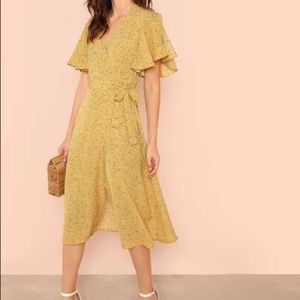 Wrap dress with ruffle sleeve Size:S Brand New!